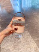 Tumbler filled with iced tea and lemon slice, lifestyle flat lay