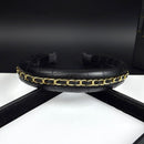 Hair clip styled on a low chignon hairstyle, natural lighting