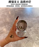 White tumbler in tote bag with top partially open — showcasing portability