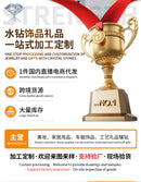 Aqua crystal bottle next to eucalyptus leaves for spa-inspired context