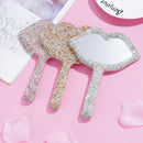 Side profile showing ergonomic ABS frame and crystal detailing of lip-shaped mirror