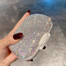 Minimalist bathroom counter setup featuring pill box and toothbrush holder