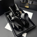 Claw clip holding a loose low bun on model's back of head