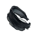 Flat lay of black and beige hair bands arranged diagonally