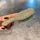 Top-down view highlighting diamond details and bristle arrangement on white-black brush