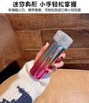 Comparison shot: rainbow tumbler next to standard 12oz tumbler for size reference