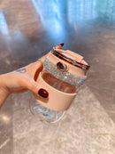 Detail of stainless steel lid hardware and matte finish