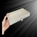 Side angle showing layered drawer structure and velvet-lined interior of jewelry storage box