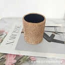 Top-down view of all six color options arranged neatly on marble surface