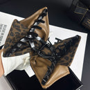 Claw clip holding a mid-length wavy hairstyle — lifestyle shot