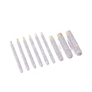 Close-up of rhinestone inlay on a champagne-colored wooden brush handle