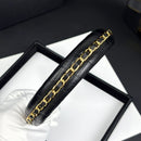 Side angle showing leather texture and delicate chain detail