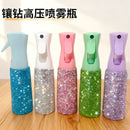 Front view of luxury crystal-embellished 300ml mist spray bottle on white background