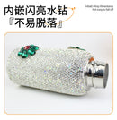 Blue tumbler filled with cold brew coffee, steam-free surface — hot/cold contrast