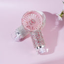 Close-up of crystal-accented front panel and mist nozzle detail