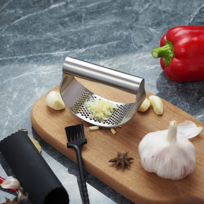 Hand-held Garlic Press